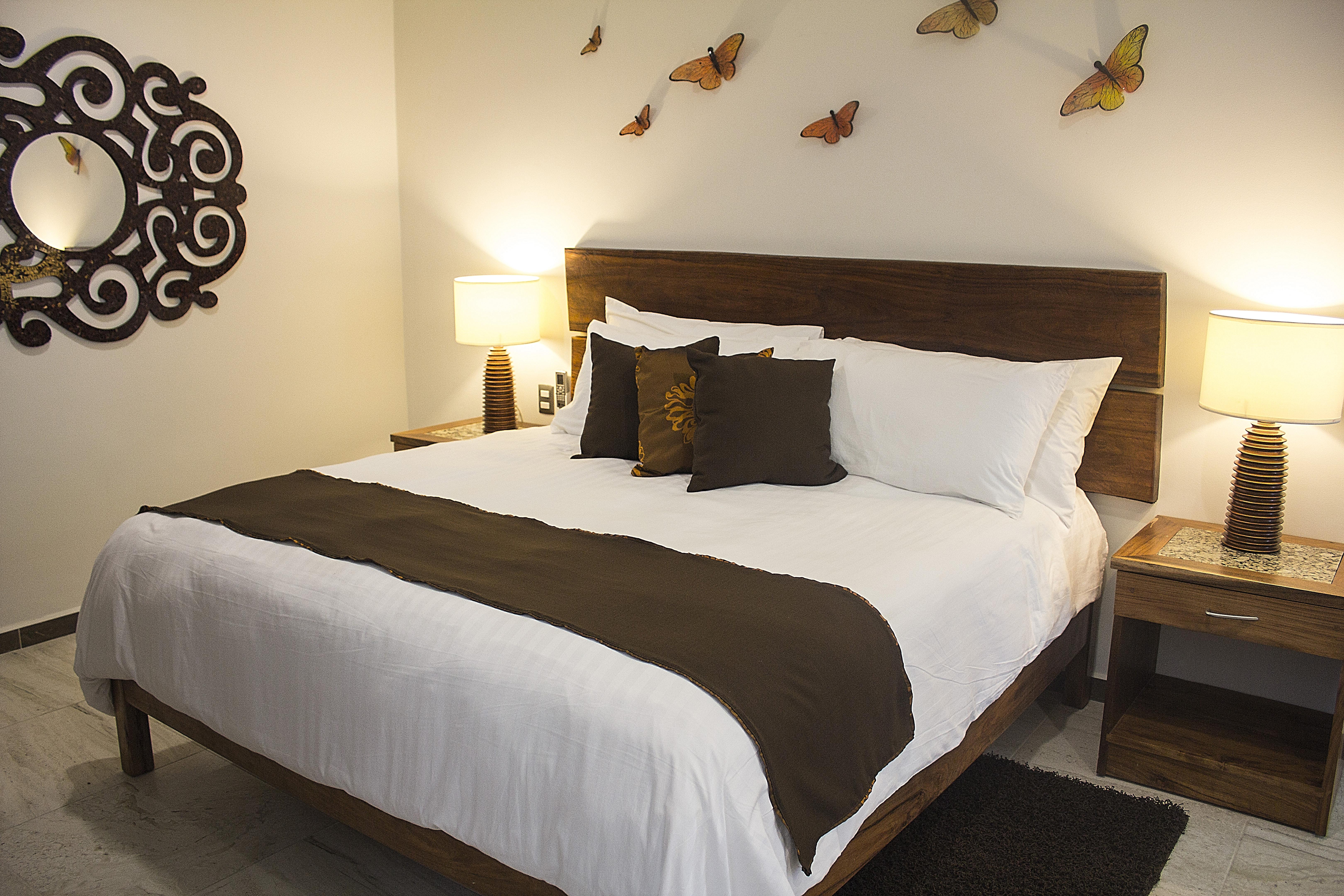 Casa Ticul Hotel Boutique - 5Th Ave (Adults Only) Playa del Carmen Buitenkant foto A bed with a bed runner