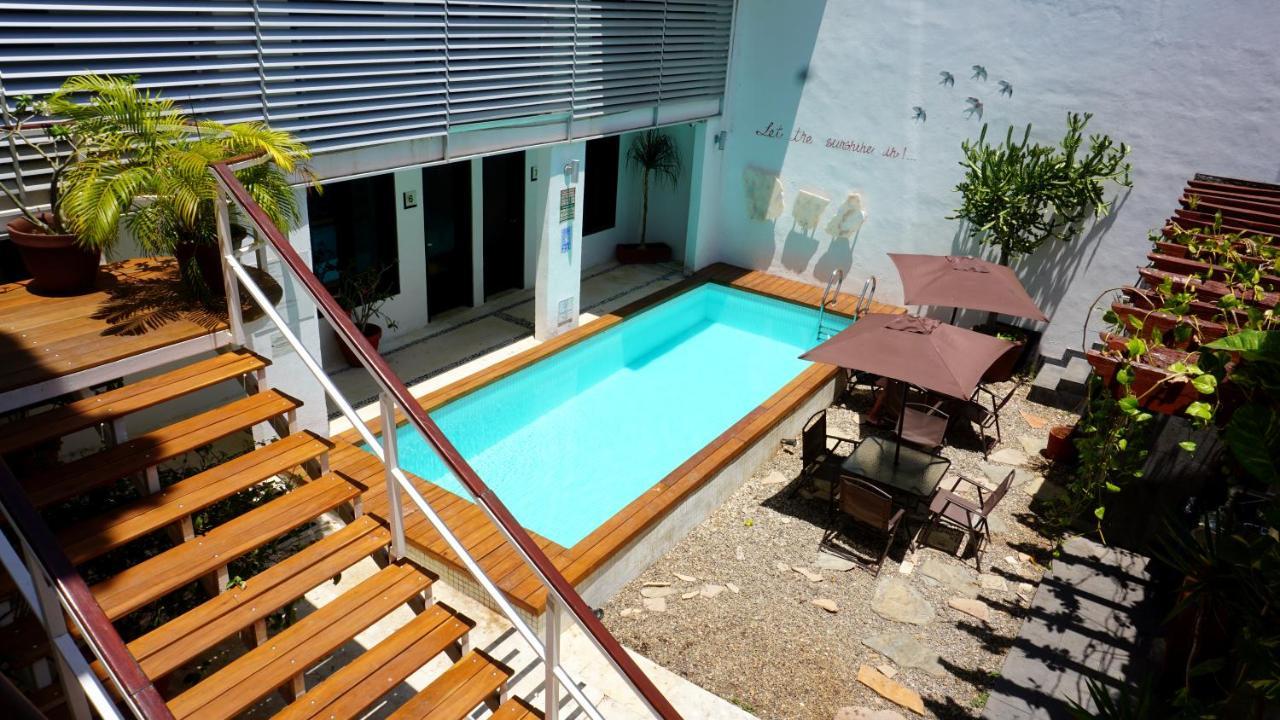 Casa Ticul Hotel Boutique - 5Th Ave (Adults Only) Playa del Carmen Buitenkant foto A swimming pool in a courtyard